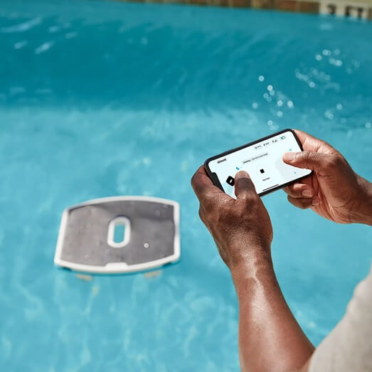 maytronics dolphin skimmi solar powered pool surface skimmer in pool app controlled worldofpools