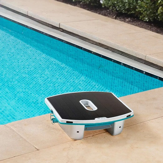 maytronics dolphin skimmi solar powered pool surface skimmer side of pool close-up worldofpools